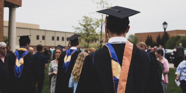 man wearing academic gown